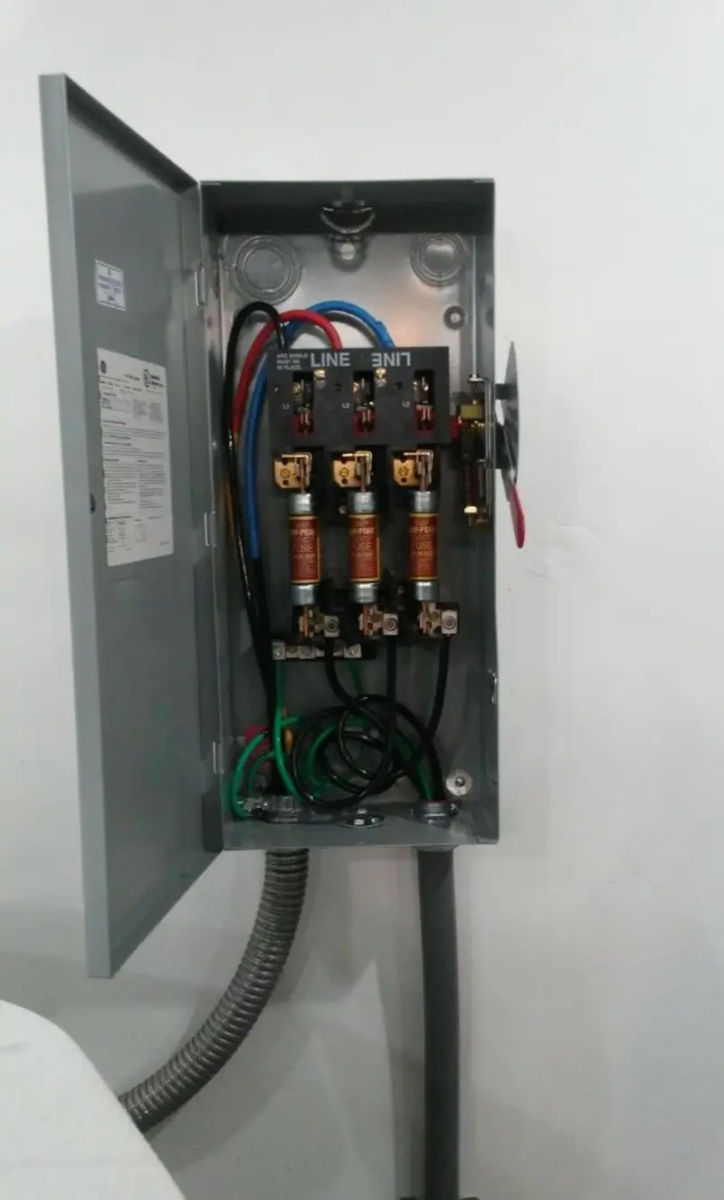 Three-phase disconnect switch installed for Smoke Detector Installation in Doraville